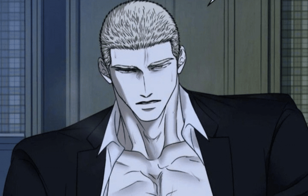 Shutline Jake in a dark suit with an open white shirt.