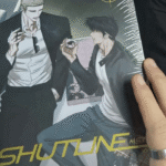 Shutline manhwa book featuring Jake and Shin.