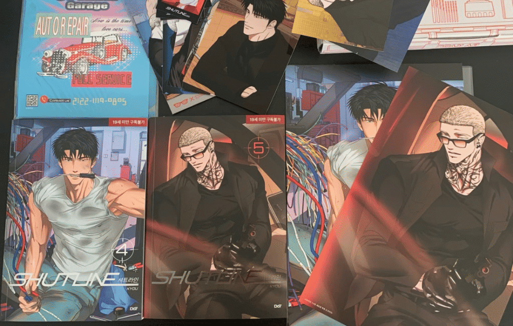 Collection of Shutline Book physical copies and merch.