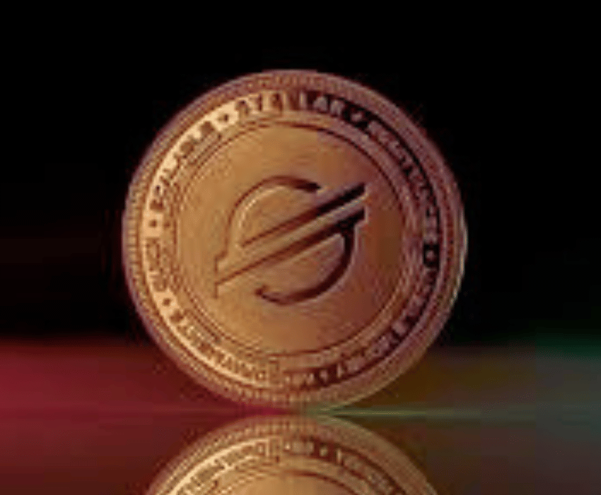 Stellar lon: xlm gold cryptocurrency coin on reflective surface.