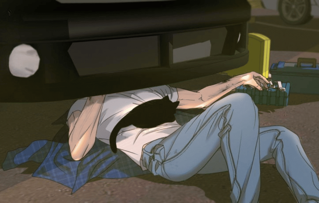 Mechanic with a black cat under a car in shutline read.