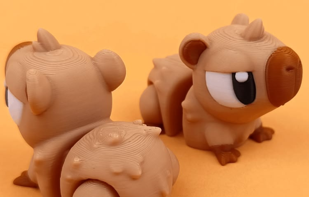 3D printed capybara toy figures from Capybara Clicker.