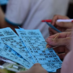 Premier Lotteries ticket with printed lucky numbers