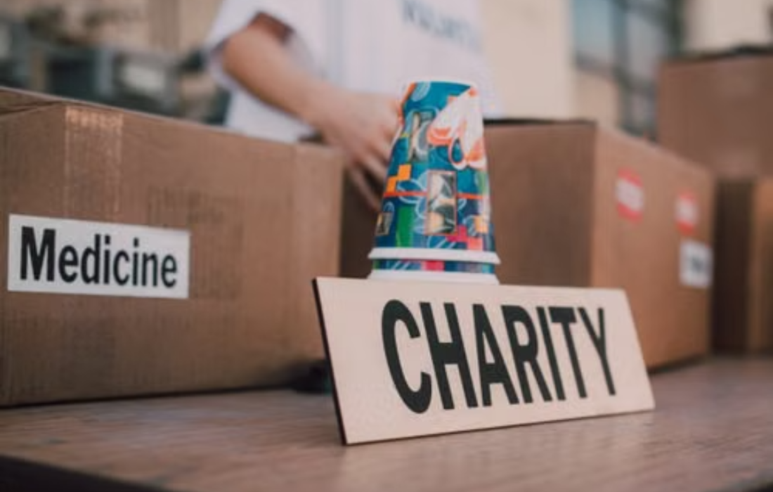 Premier Lotteries charity donation box with medicine