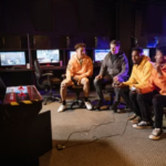 amers playing arcade and console games together.amers playing arcade and console games together.
