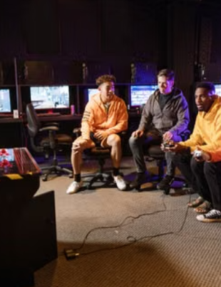 amers playing arcade and console games together.amers playing arcade and console games together.