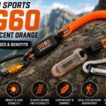 Action Sports OG60 Fluorescent Orange tether with carabiners on a rocky outdoor surface.