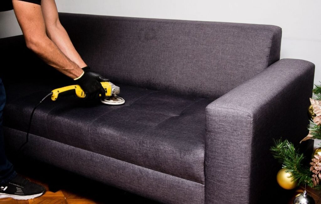 Calvin Power Reclining Sofa in Pecan being professionally cleaned
