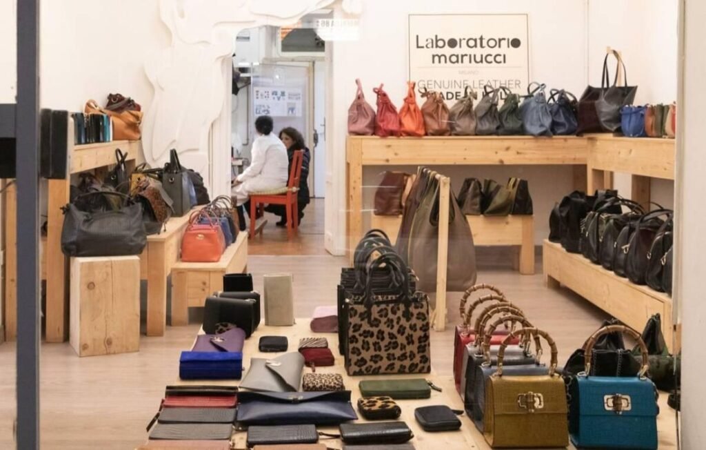 Pelletteria Angelo Import Export genuine leather bags displayed at Laboratorio Mariucci store